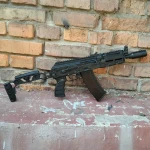 Folding adapter for installing a stock on AKS and AKSU-based carbines